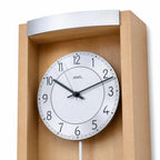 Standuhren.com 🕰️ AMS Pendel-Funkwanduhr aus hellem Buchenholz mit Aluminium-Zifferblatt und moderner Applikation